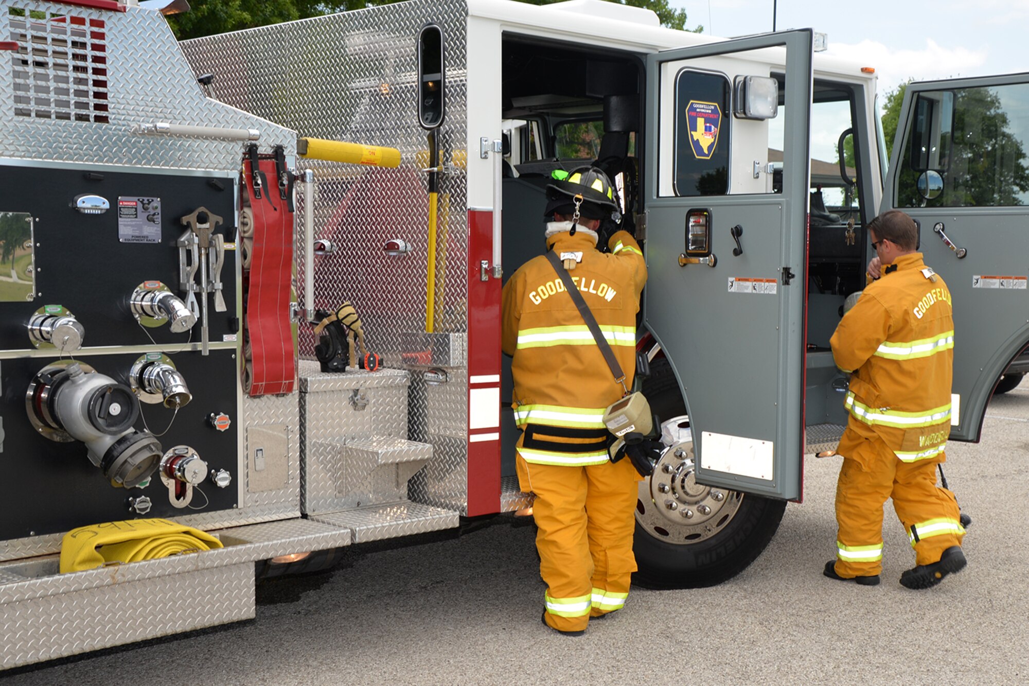 Firefighters from the 17th Civil Engineer Squadron Fire Emergency Services respond to Bldg. 533 after a simulated tornado hit Goodfellow Air Force Base, Texas, April 21, 2016. Goodfellow used the exercise to test the base first responders ability to react to a natural disaster. (U.S. Air Force photo by Airman 1st Class Randall A.S. Moose/Released)