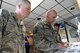 U.S. Air Force Staff Sgt. Robert Thomas, left, the 90th Communications Squadron NCO in charge of visual imagery and intrusion detection systems, and Master Sgt. George V. Shepherd III, a 90th Missile Security Forces Squadron flight chief, read an informational book about the retired Oscar-1 missile alert facility at Whiteman Air Force Base (AFB), Mo., April 14, 2016. Members of the 90th Missile Wing at F.E. Warren AFB, Wyo., visited Whiteman to observe how the 509th and 131st Bomb Wings execute vital strategic deterrence missions on a day-to-day basis and during heightened-alert operations.