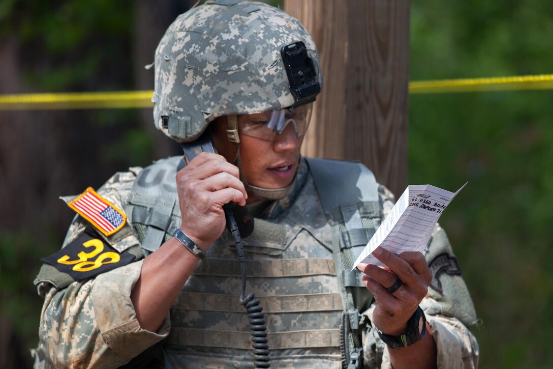 Army Sgt. 1st Class Eugene Mirador calls in a medical evacuation request for a simulated casualty during the Best Ranger Competition at Fort Benning, Ga., April 16, 2016. Mirador is assigned to the 75th Ranger Regiment. Army photo by Sgt. Austin Berner
