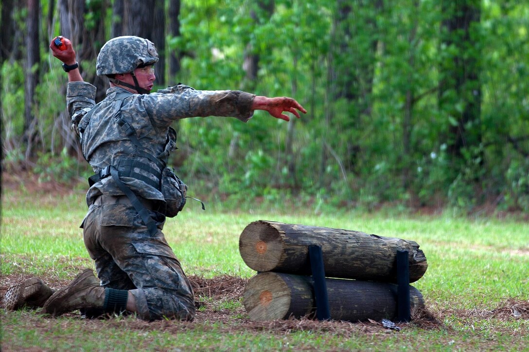 Army 1st Lt. Cody Chick throws a dummy grenade during the Best Ranger Competition at Fort Benning, Ga., April 16, 2016. Chick is assigned to the 82nd Airborne Division. Army photo by Sgt. Austin Berner