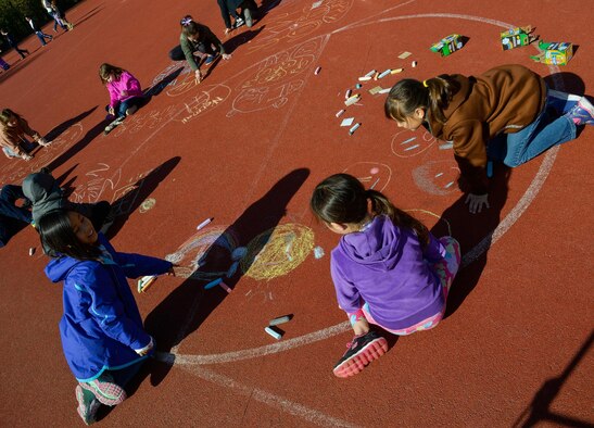 Children from Vogelweh Elementary School draw out their emotions during a therapy session April 21, 2016, at Vogelweh Air Base, Germany. Dozens of families recently separated from service members in Turkey and now live in the Kaiserslautern military community. (U.S. Air force photo/Airman 1st Class Lane T. Plummer) 