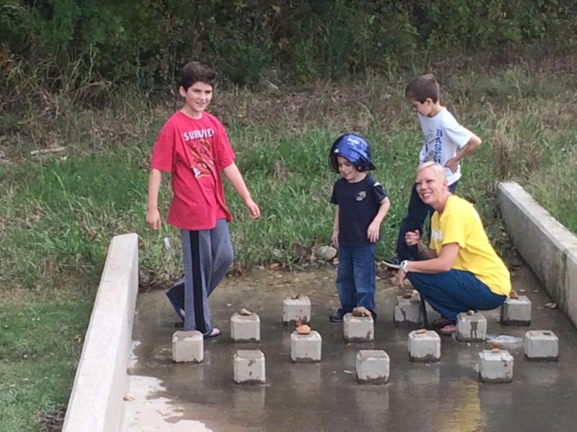 Dawson Stock, pictured here with his two brothers and therapist.  Dawson was diagnosed with autism weeks before his 3rd birthday. According to Dawson's parents, he has grown and developed in leaps and bounds since beginning ABA therapy. (Courtesy Photo)