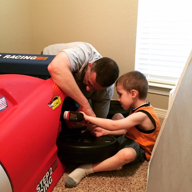 Dawson Stock is pictured here with his father Maj. Michael Stock. Dawson was diagnosed with autism in 2014. Through a combination of speech therapy, occupational therapy and applied behavior analysis, Dawson has continued to grow and develop in leaps and bounds. (Courtesy Photo)