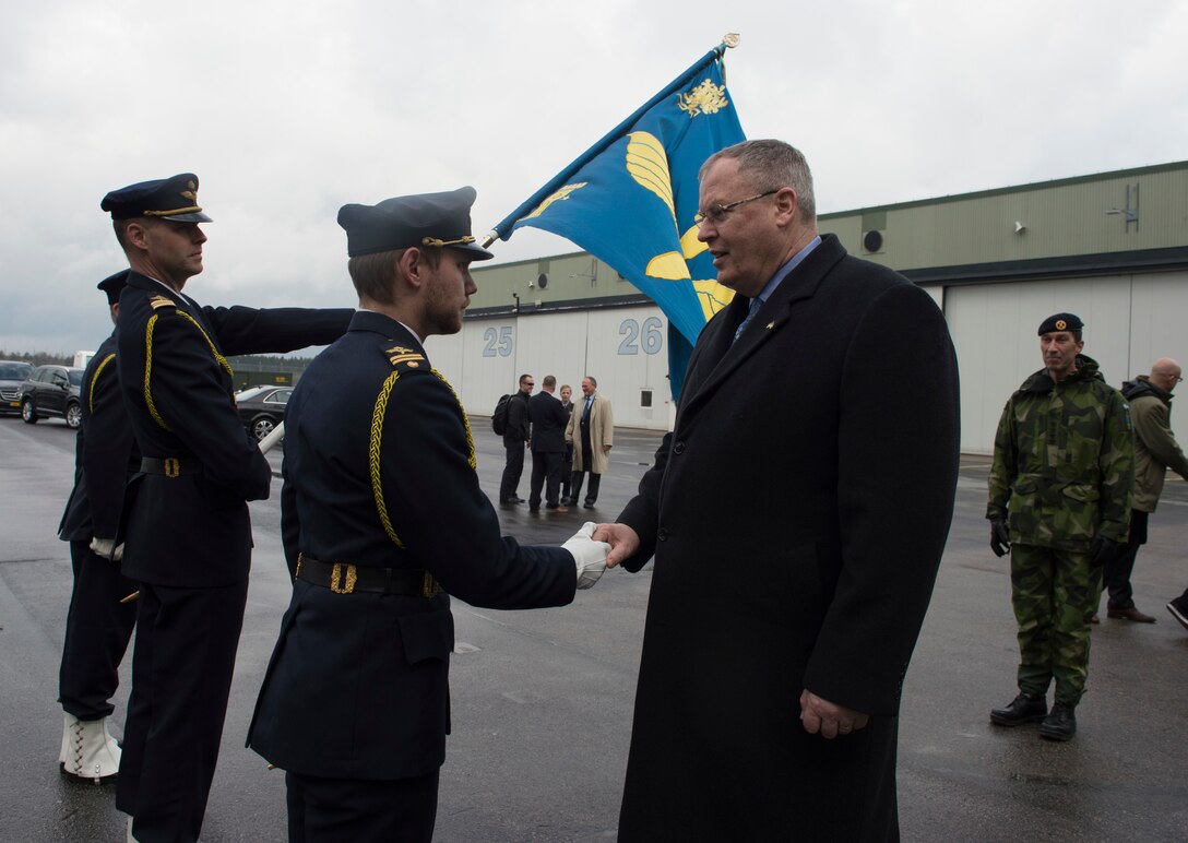 Deputy Defense Secretary Bob Work exchanges greetings with troops at the Swedish Air Force base in Ronneby, Sweden, April 27, 2016. DoD photo by Navy Petty Officer 1st Class Tim D. Godbee