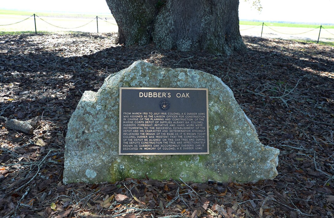 A plaque beneath the limbs of the Southern Live Oak tree, named “Dubber’s Oak,” describes Col. A. E. Dubber’s significant role in the construction of now what is called Marine Corps Logistics Base Albany. Dubber was the resident officer-in-charge of construction during the time the base was being built and served aboard the installation from February 1951 to July 1955.