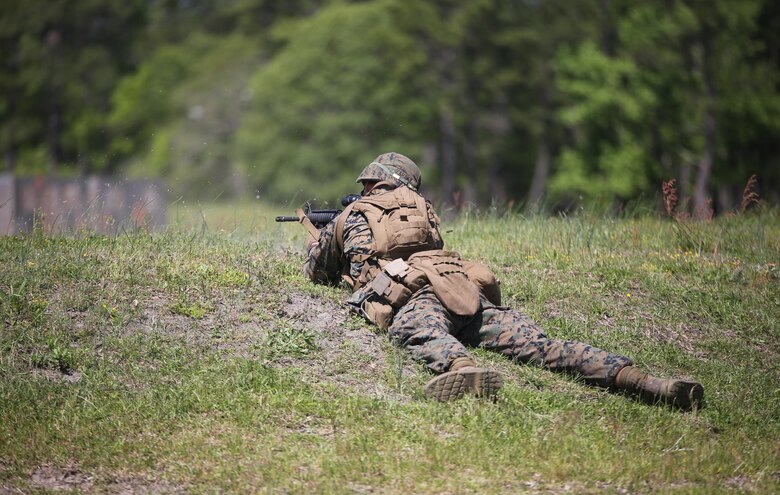 Pfc. Joshua Zapsky, a rifleman with Kilo Company, 3rd Battalion, 8th Marine Regiment, engages targets down range during a fire-team attack exercise as part of the battalion field exercise at Camp Lejeune, N.C., April 26, 2016. The unit is slated to conduct a training package at Marine Corps Mountain Warfare Training Center Bridgeport, Calif., in the coming months. (U.S. Marine Corps photo by Cpl. Paul S. Martinez/Released)