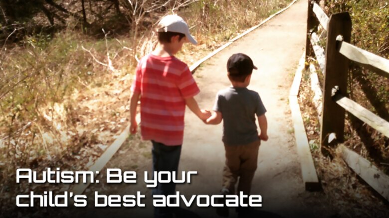 Dawson Stock (right) takes a walk with his brother, Gavin Stock (left). Dawson was diagnosed with autism weeks before his 3rd birthday. He is currently enrolled in speech therapy, occupational therapy and applied behavior analysis through TRICARE. (Courtesy Photo)