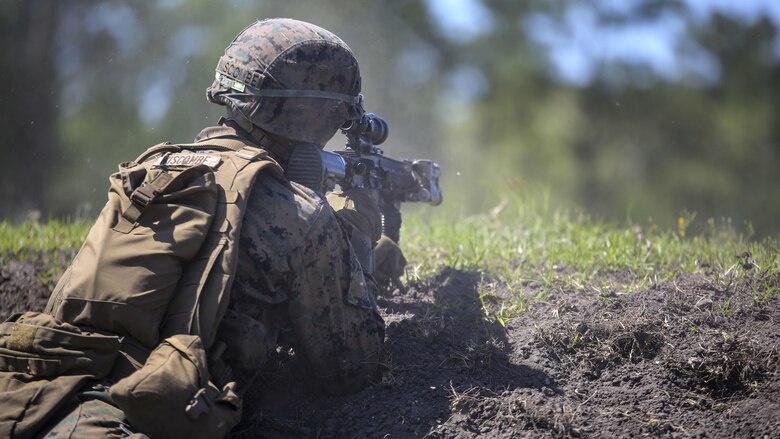 Pfc. Adam J. Wiscombe, a rifleman with Kilo Company, 3rd Battalion, 8th Marine Regiment, engages targets down range during a fire team attack exercise as part of the battalion field exercise at Marine Corps Base Camp Lejeune, North Carolina, April 26, 2016. The FEX, now in its final week of operations, previously tested Marines on basic infantry fundamentals such as patrolling and land navigation.