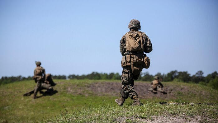 Pfc. Adam J. Wiscombe, a rifleman with Kilo Company, 3rd Battalion, 8th Marine Regiment, rushes down range during a fire-team attack exercise as part of the battalion field exercise at Marine Corps Base Camp Lejeune, North Carolina, April 26, 2016. The FEX, now in the final week of operations, previously tested Marines on basic infantry fundamentals such as patrolling and land navigation.