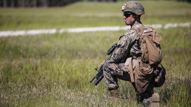 Lance Cpl. Israel B. Carroll, a rifleman with Kilo Company, 3rd Battalion, 8th Marine Regiment, prepares to engage targets down range during a fire-team attack exercise as part of the battalion field exercise at Marine Corps Base Camp Lejeune, North Carolina, April 26, 2016. The unit is slated to conduct a training package at Marine Corps Mountain Warfare Training Center Bridgeport, Calif., in the coming months.