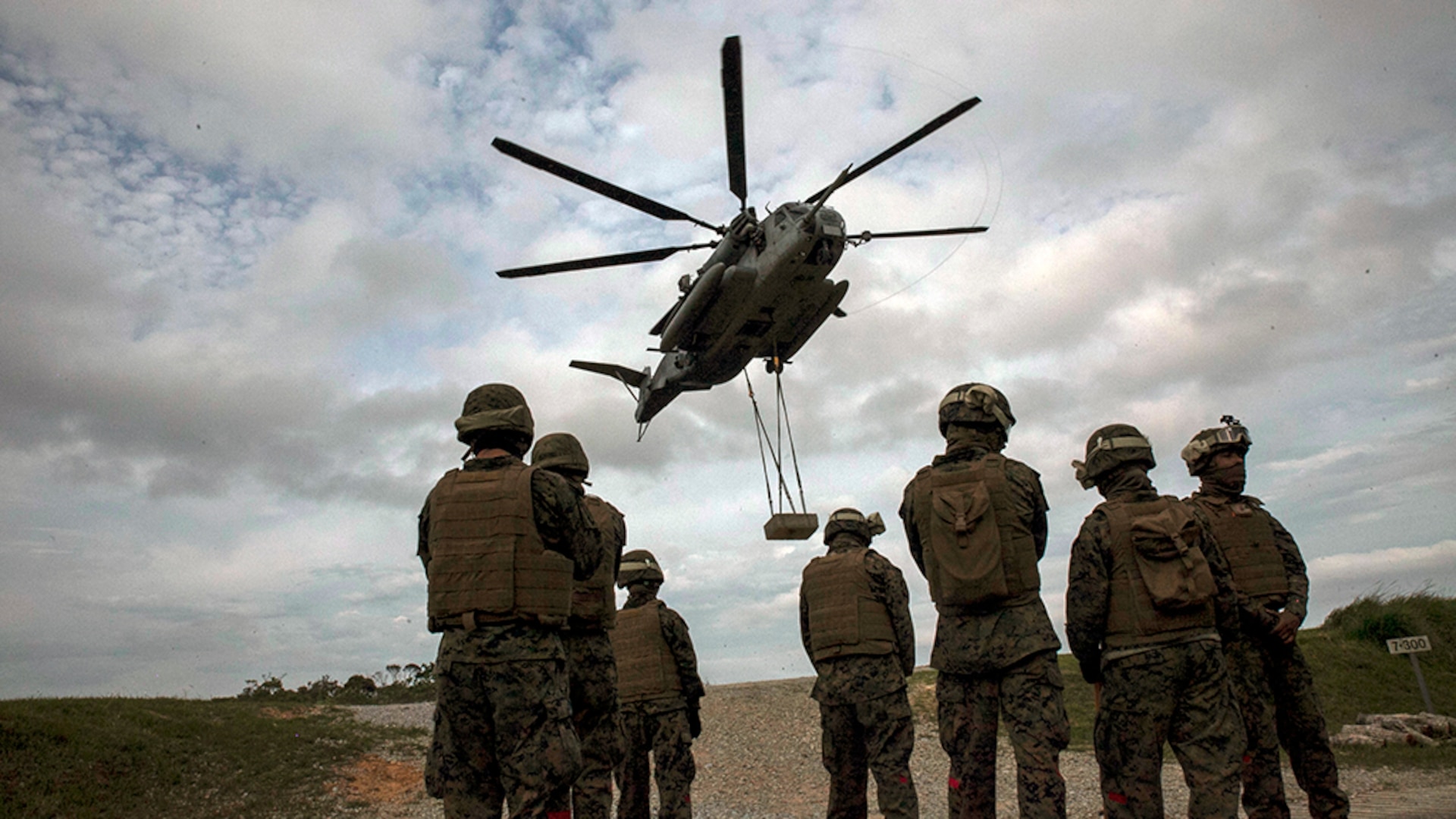 Marines conduct a helicopter support team exercise at Marine Corps Air Station Futenma, Okinawa, Japan, April 22, 2016. The Marines are landing support specialists, commonly referred to as red patchers, with Landing Support Detachment, 3rd Transportation Support Battalion, Combat Logistics Regiment 3, 3rd Marine Logistics Group, III Marine Expeditionary Force. 