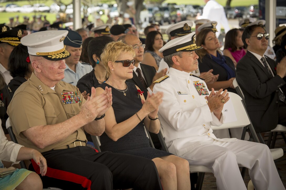Pacific Command Commander Adm. Harry Harris and U.S. Marine Corps Forces, Pacific Commander Lt. Gen. John A. Toolan applaud after the introductory remarks of both the New Zealand and Australian Consulate-General during the Australia New Zealand Army Corps Day ceremony held at the National Memorial Cemetery of the Pacific, April 25, 2016. Harris and Toolan presented wreaths in honor of the sacrifices made by the Australian and New Zealand forces during World War I. The U.S. Marine Corps and Australian Defense Forces share an enduring alliance through the Marine Rotational Force – Darwin, which deploys in a rotational manner for six months out of the year in Darwin, Australia. 