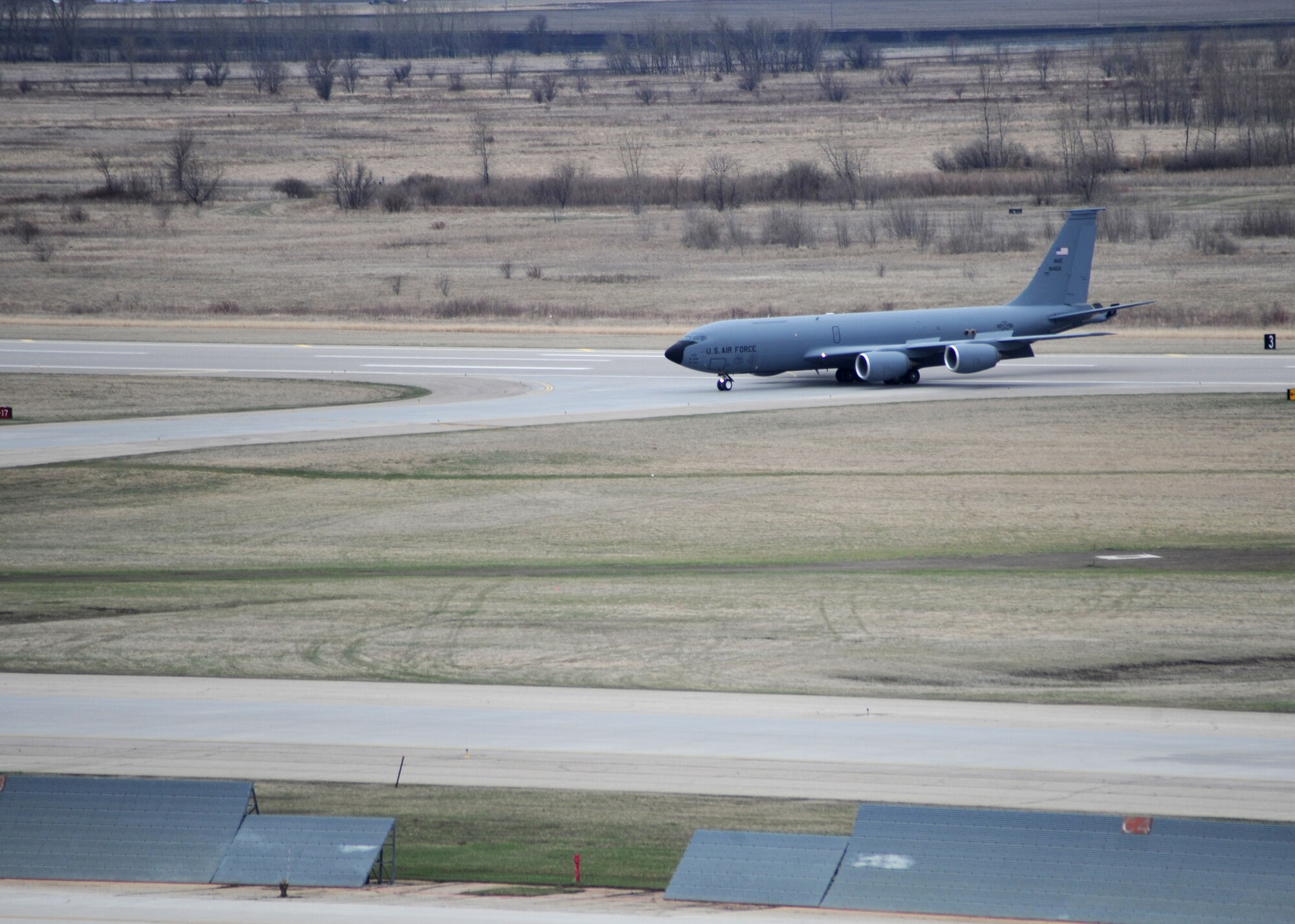 A KC-135 Stratotanker taxis down the flight line April 26, 2016, on Grand Forks Air Force Base, N.D. The aircraft was one of the first of several aircraft that traveled to Grand Forks AFB to escape severe weather warnings at their home stations. (U.S. Air Force photo by Staff Sgt. Desiree Economides/Released)