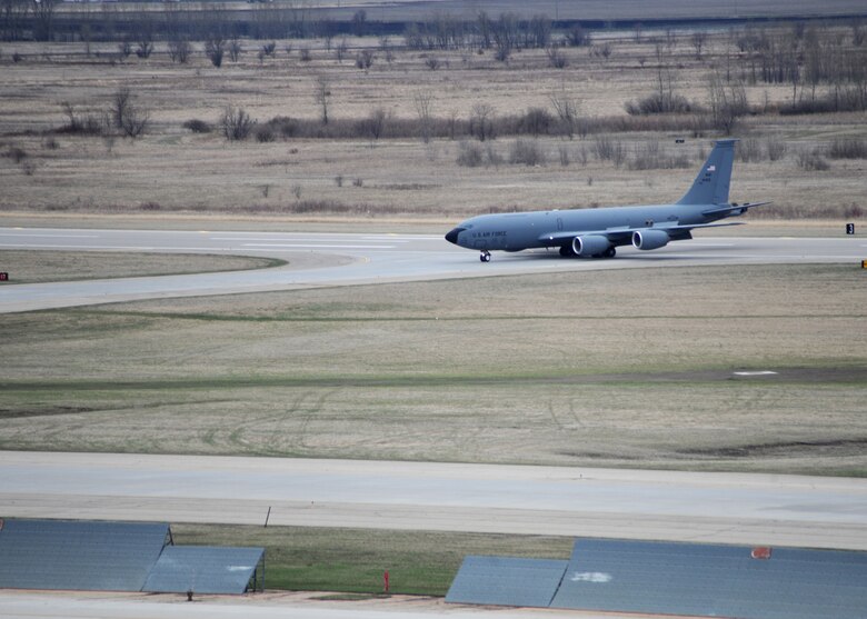A KC-135 Stratotanker taxis down the flight line April 26, 2016, on Grand Forks Air Force Base, N.D. The aircraft was one of the first of several aircraft that traveled to Grand Forks AFB to escape severe weather warnings at their home stations. (U.S. Air Force photo by Staff Sgt. Desiree Economides/Released)