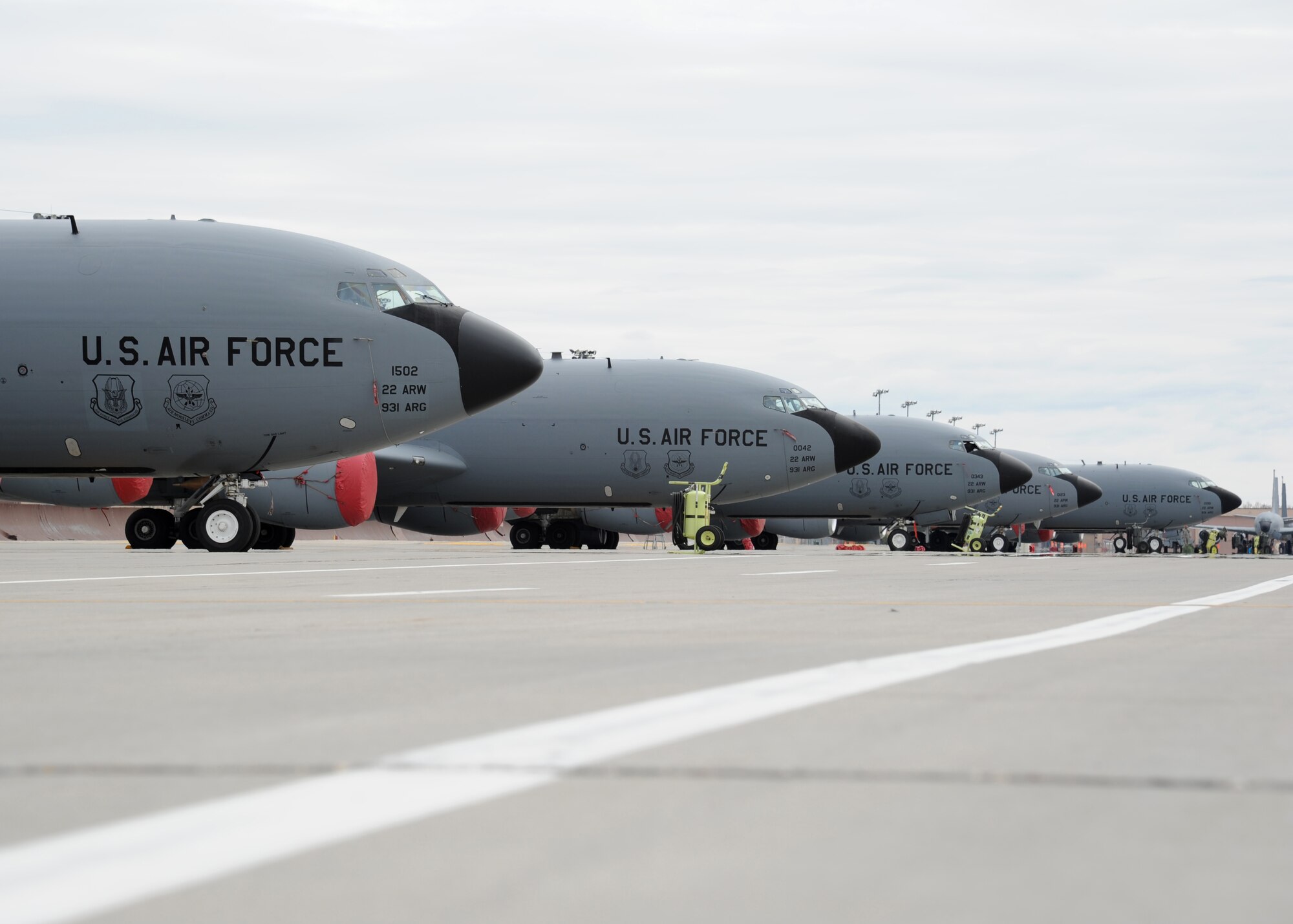 Several KC-135 Stratotankers sit on the flight line April 26, 2016, on Grand Forks Air Force Base, N.D. The aircraft waited out severe weather in the Midwest before returning to their home stations. (U.S. Air Force photo by Airman 1st Class Ryan Sparks/Released)