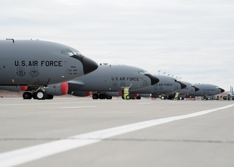 Several KC-135 Stratotankers sit on the flight line April 26, 2016, on Grand Forks Air Force Base, N.D. The aircraft waited out severe weather in the Midwest before returning to their home stations. (U.S. Air Force photo by Airman 1st Class Ryan Sparks/Released)