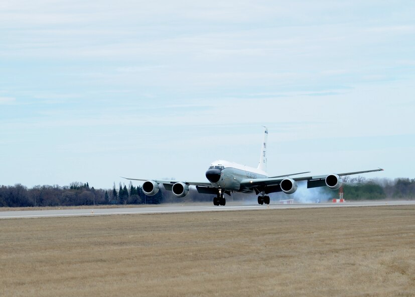 An RC-135V/W Rivet Joint reconnaissance aircraft lands on the flight line April 26, 2016, on Grand Forks Air Force Base, N.D. The aircraft from Offutt Air Force Base, Neb., traveled to Grand Forks AFB to escape a severe weather threat and will stay until the threat has passed. (U.S. Air Force photo by Airman 1st Class Ryan Sparks/Released)