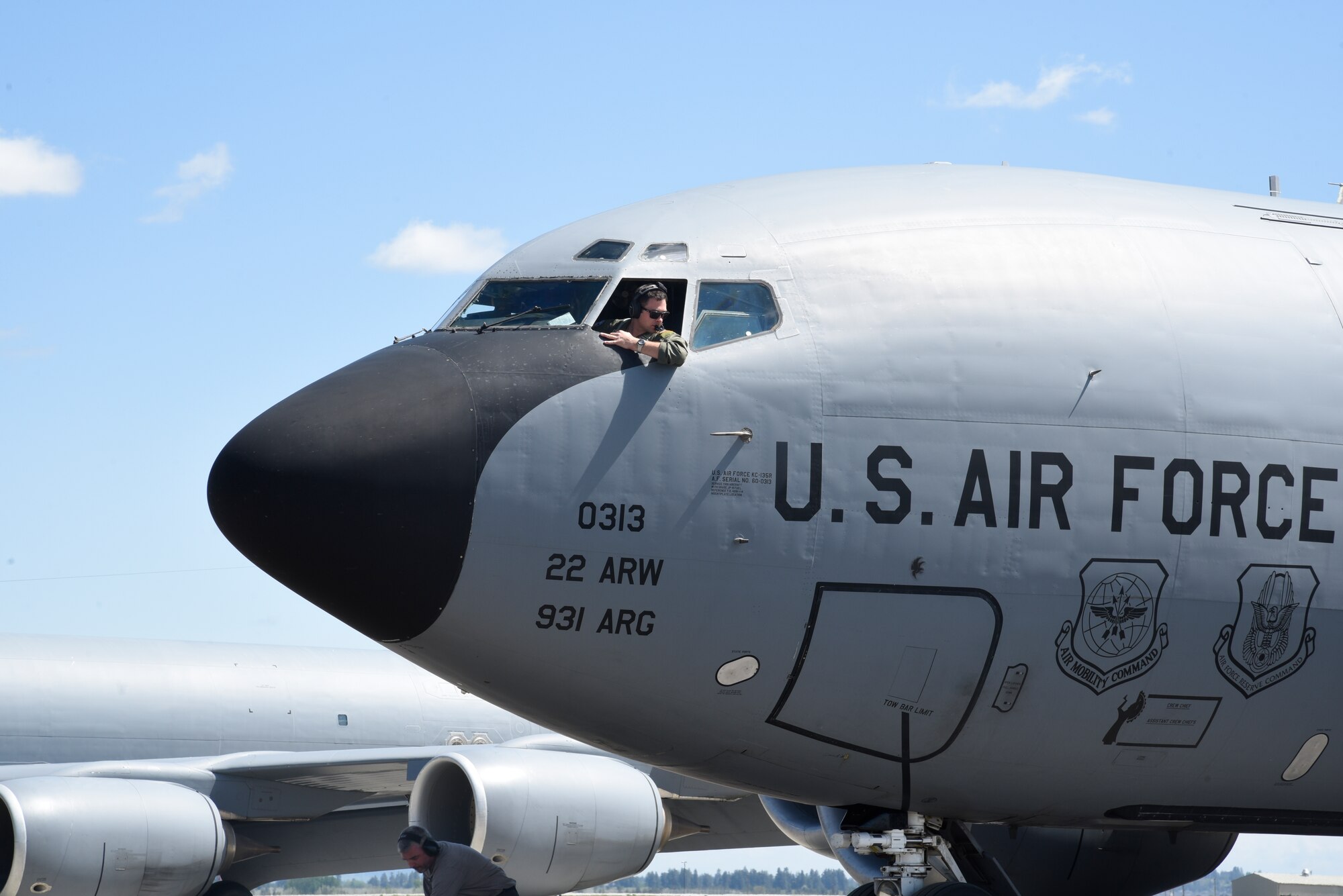 A pilot from McConnell Air Force Base, Kan., taxis in a KC-135 Stratotanker April 26, 2016, at Fairchild AFB, Wash. Because of its ramp space, logistical capabilities, and maintenance facilities, Fairchild received six KC-135 Stratotankers that were evacuated from McConnell due to projected severe weather. (U.S. Air Force photo/Airman 1st Class Taylor Bourgeous)