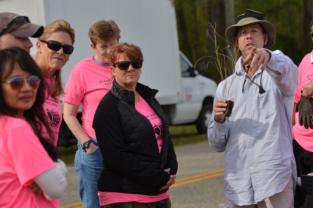Timothy Christensen, environmental and natural resources specialist assigned to the733rd Civil Engineer Division, briefs volunteers before a shoreline planting at Fort Eustis, Va., April 19, 2016. The CED hosts the marsh grass planting every year in an effort to prevent erosion and preserve inland habitats of the installation. (U.S. Air Force photo by Staff Sgt. Natasha Stannard)