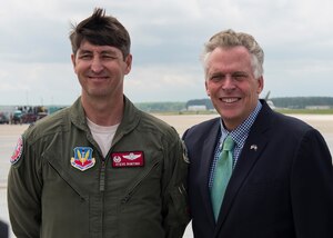 U.S. Air Force Col. Steve Bunting, commander of the 192nd Fighter Wing, poses with Virginia Governor Terry McAullife at Langley Air Force Base, Va., April 23, 2016. McAullife visited during the AirPower over Hampton Roads Open House, which is aimed at educating the public on past and present Air Force aerial capabilities, increase recruiting and show appreciation to the local community. (U.S. Air Force photo by Airman 1st Class Derek Seifert)