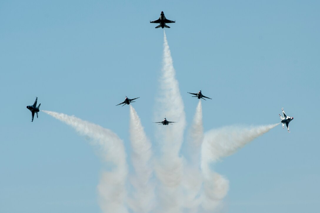 The Thunderbirds aerial demonstration team paint the sky during the AirPower over Hampton Roads Open House at Langley Air Force Base, Va., April 24, 2016. Millions of people have witnessed the Thunderbirds demonstrations, and in turn, have seen the pride, professionalism and dedication of hundreds of thousands of Airmen serving at home and abroad. (U.S. Air Force photo by Airman 1st Class Kaylee Dubois)