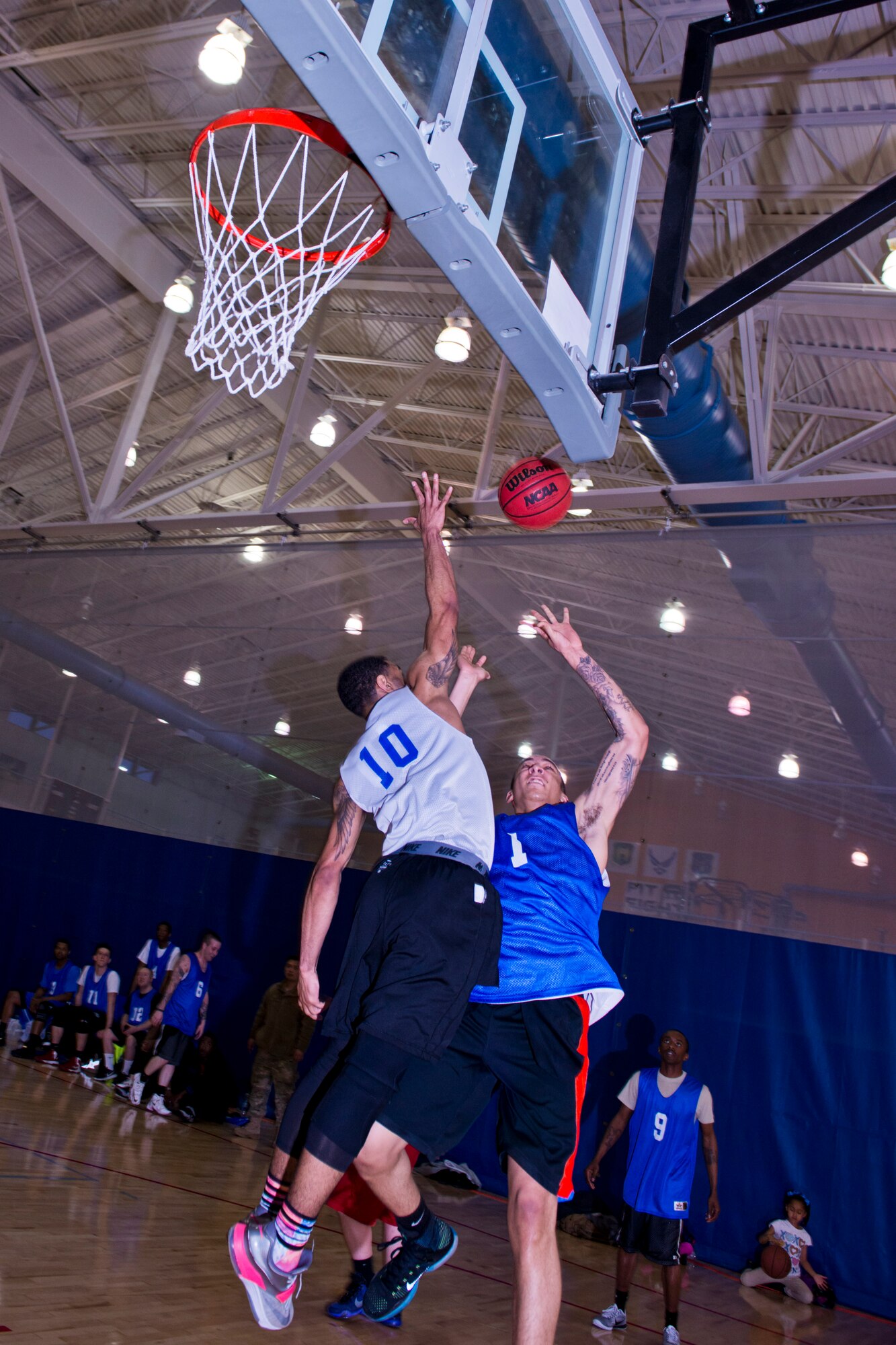 Members of the 791st Missile Security Forces Squadron played against the 5th Security Forces Squadron in the intramural basketball championship game at Minot Air Force Base, N.D., April 19, 2016. The 791st MSFS won the championship game with a final score of 83 to 63. (U.S. Air Force photos/Airman 1st Class J.T. Armstrong)