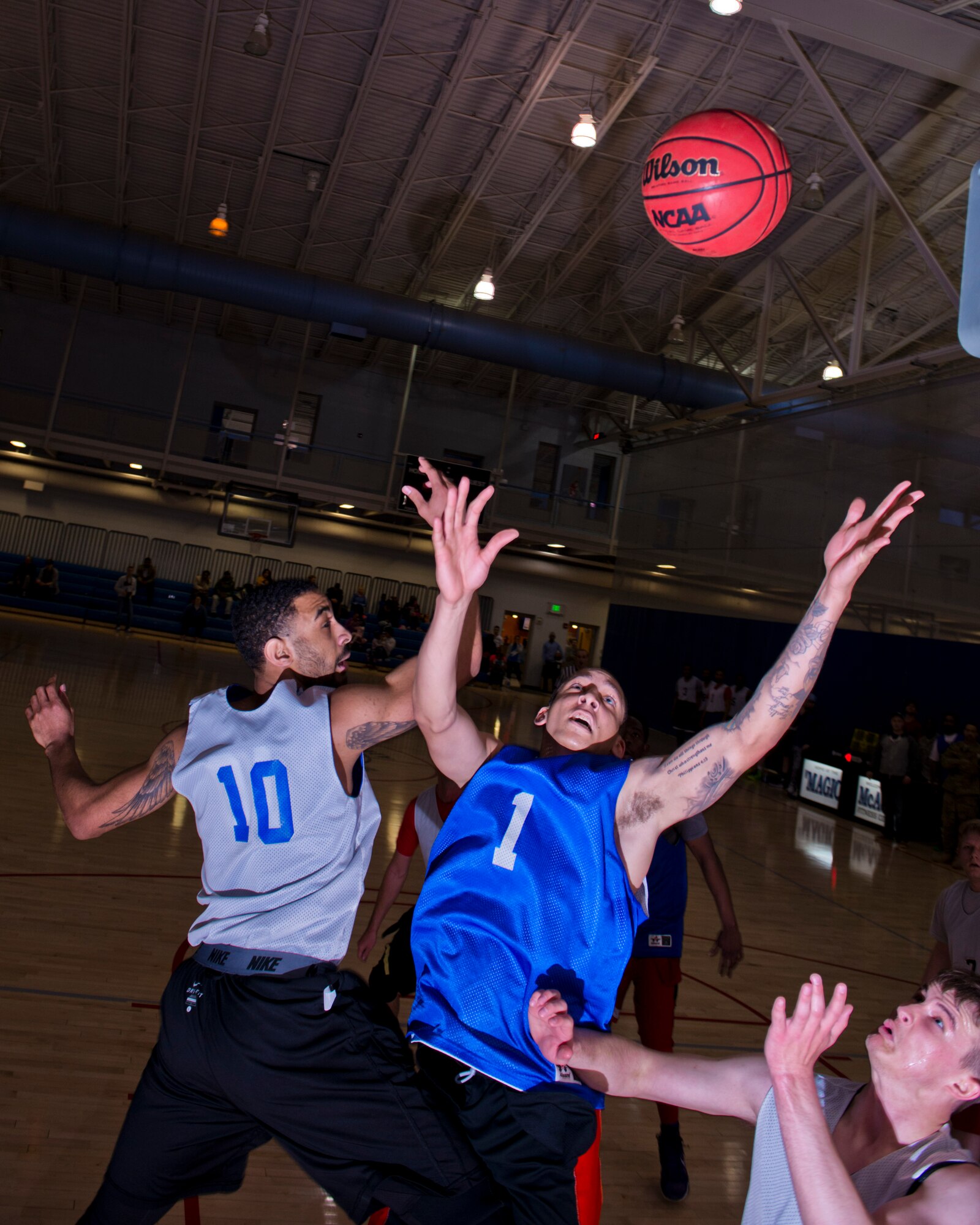 Members of the 791st Missile Security Forces Squadron played against the 5th Security Forces Squadron in the intramural basketball championship game at Minot Air Force Base, N.D., April 19, 2016. The 791st MSFS won the championship game with a final score of 83 to 63. (U.S. Air Force photos/Airman 1st Class J.T. Armstrong)