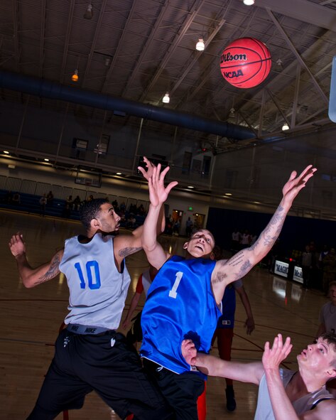 Members of the 791st Missile Security Forces Squadron played against the 5th Security Forces Squadron in the intramural basketball championship game at Minot Air Force Base, N.D., April 19, 2016. The 791st MSFS won the championship game with a final score of 83 to 63. (U.S. Air Force photos/Airman 1st Class J.T. Armstrong)