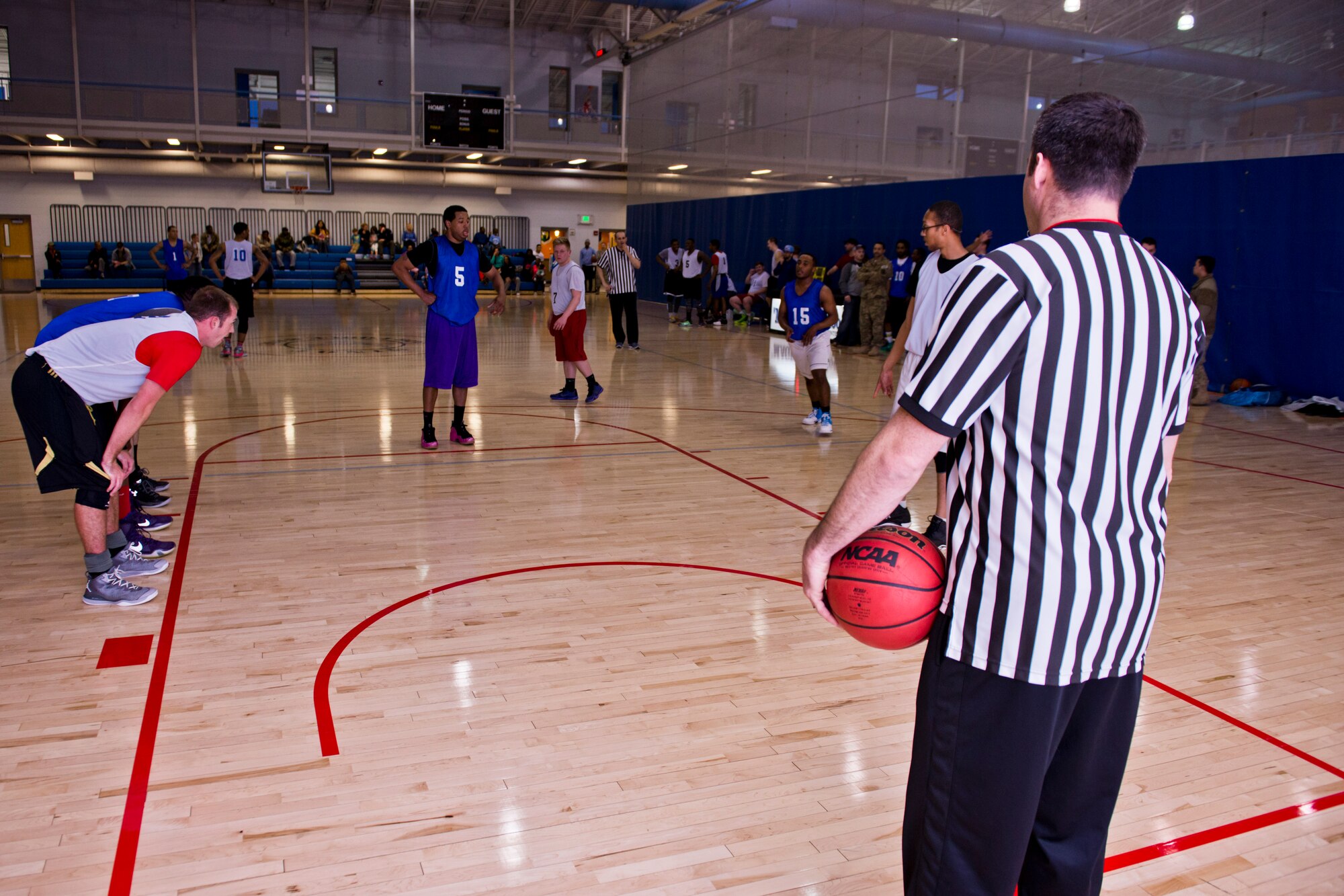Members of the 791st Missile Security Forces Squadron played against the 5th Security Forces Squadron in the intramural basketball championship game at Minot Air Force Base, N.D., April 19, 2016. The 791st MSFS won the championship game with a final score of 83 to 63. (U.S. Air Force photos/Airman 1st Class J.T. Armstrong)