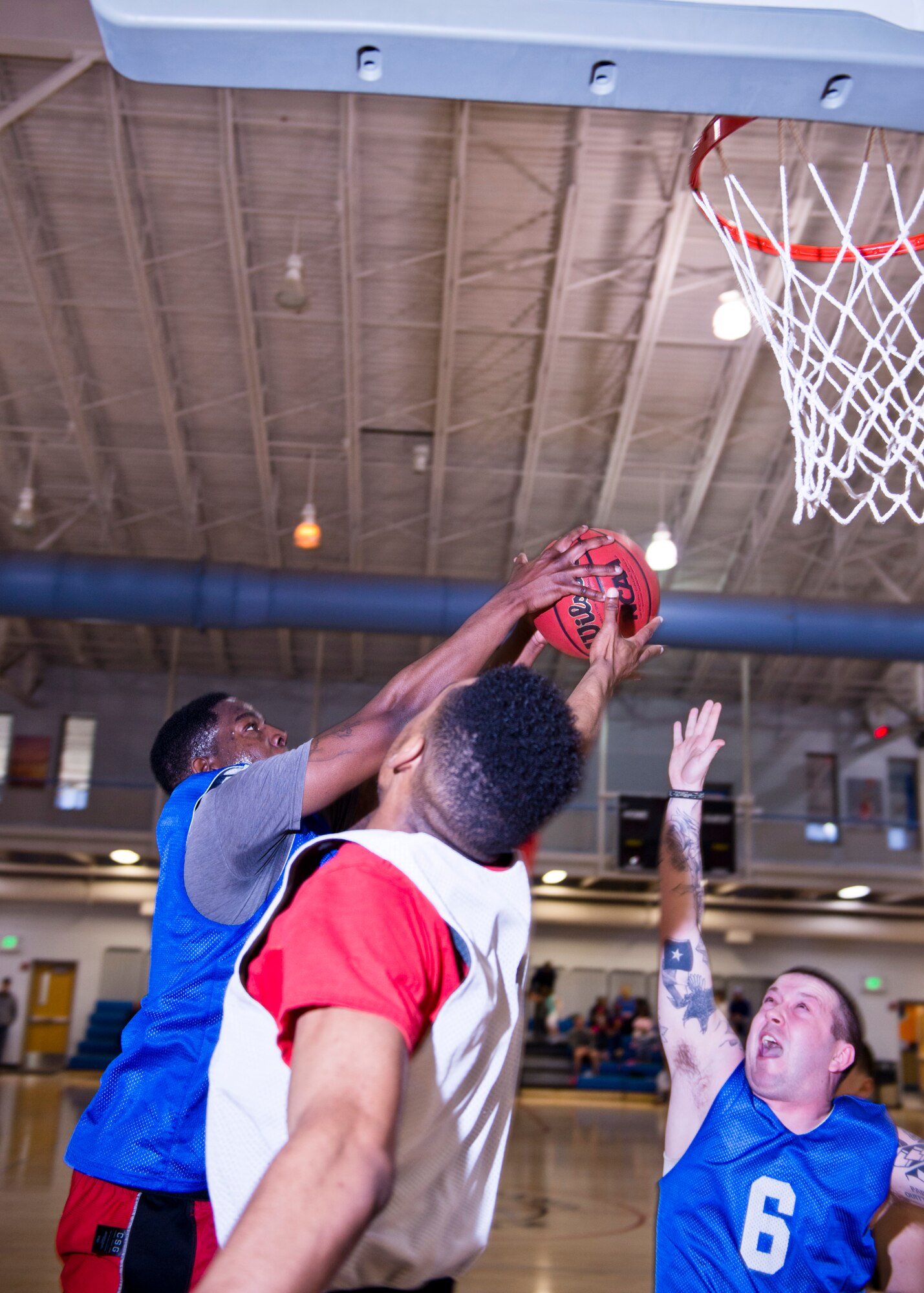 Members of the 791st Missile Security Forces Squadron played against the 5th Security Forces Squadron in the intramural basketball championship game at Minot Air Force Base, N.D., April 19, 2016. The 791st MSFS won the championship game with a final score of 83 to 63. (U.S. Air Force photos/Airman 1st Class J.T. Armstrong)