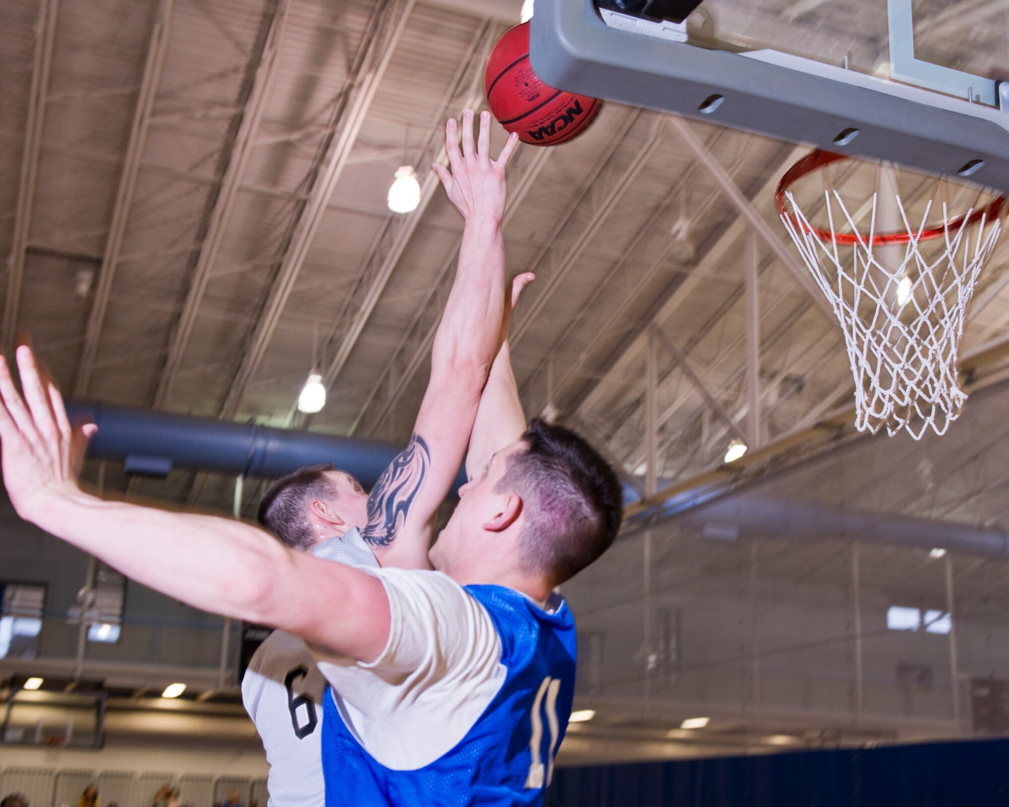 Members of the 791st Missile Security Forces Squadron played against the 5th Security Forces Squadron in the intramural basketball championship game at Minot Air Force Base, N.D., April 19, 2016. The 791st MSFS won the championship game with a final score of 83 to 63. (U.S. Air Force photos/Airman 1st Class J.T. Armstrong)