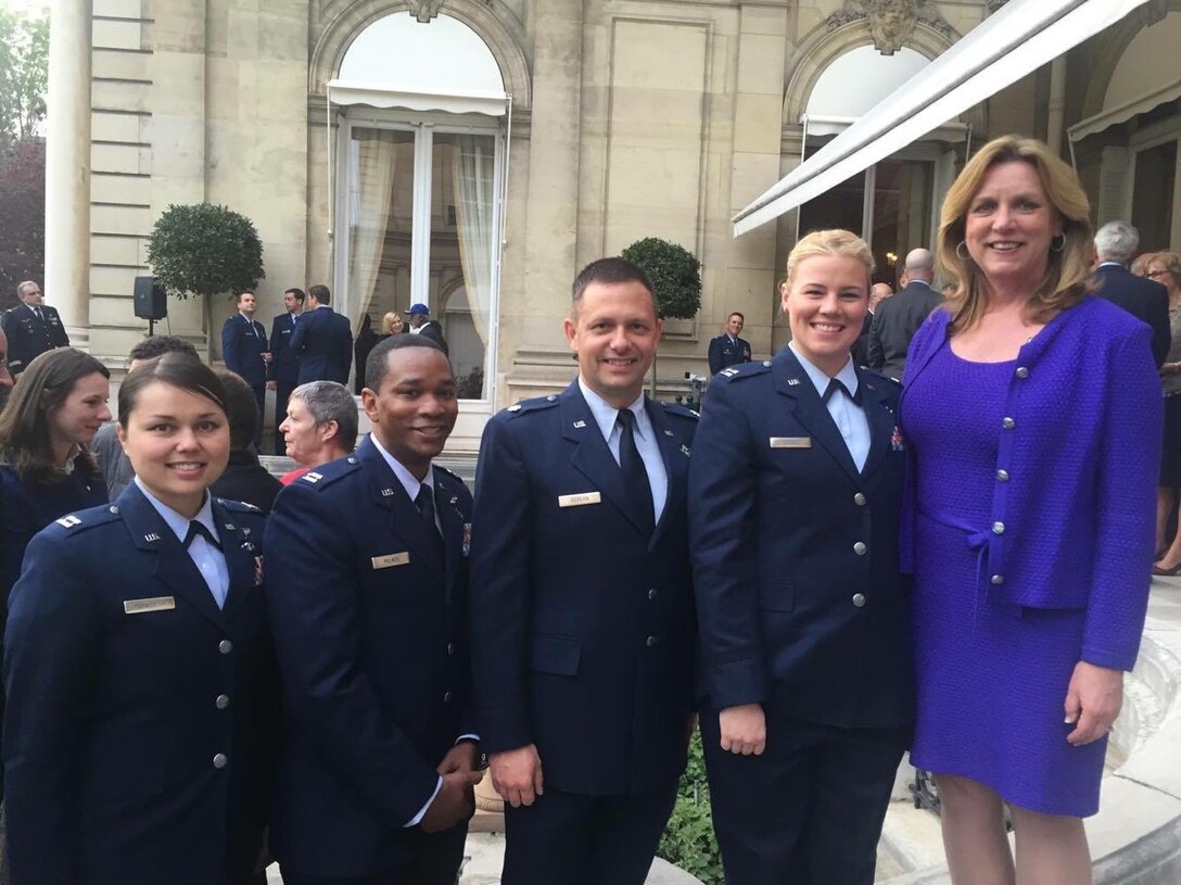 U.S. Air Force Airmen from the 28th Bomb Squadron stand with Secretary of the Air Force Deborah Lee James April 20, 2016, in Marnes-la-Coquette, France. Secretary of the Air Force Deborah Lee James and the U.S. Ambassador to France Jane Hartley attended a ceremony with other U.S. and French officials to honor the centennial formation of the Lafayette Escadrille, a unit of American Airmen who volunteered to fight alongside the French in WWI. (Courtesy photo)