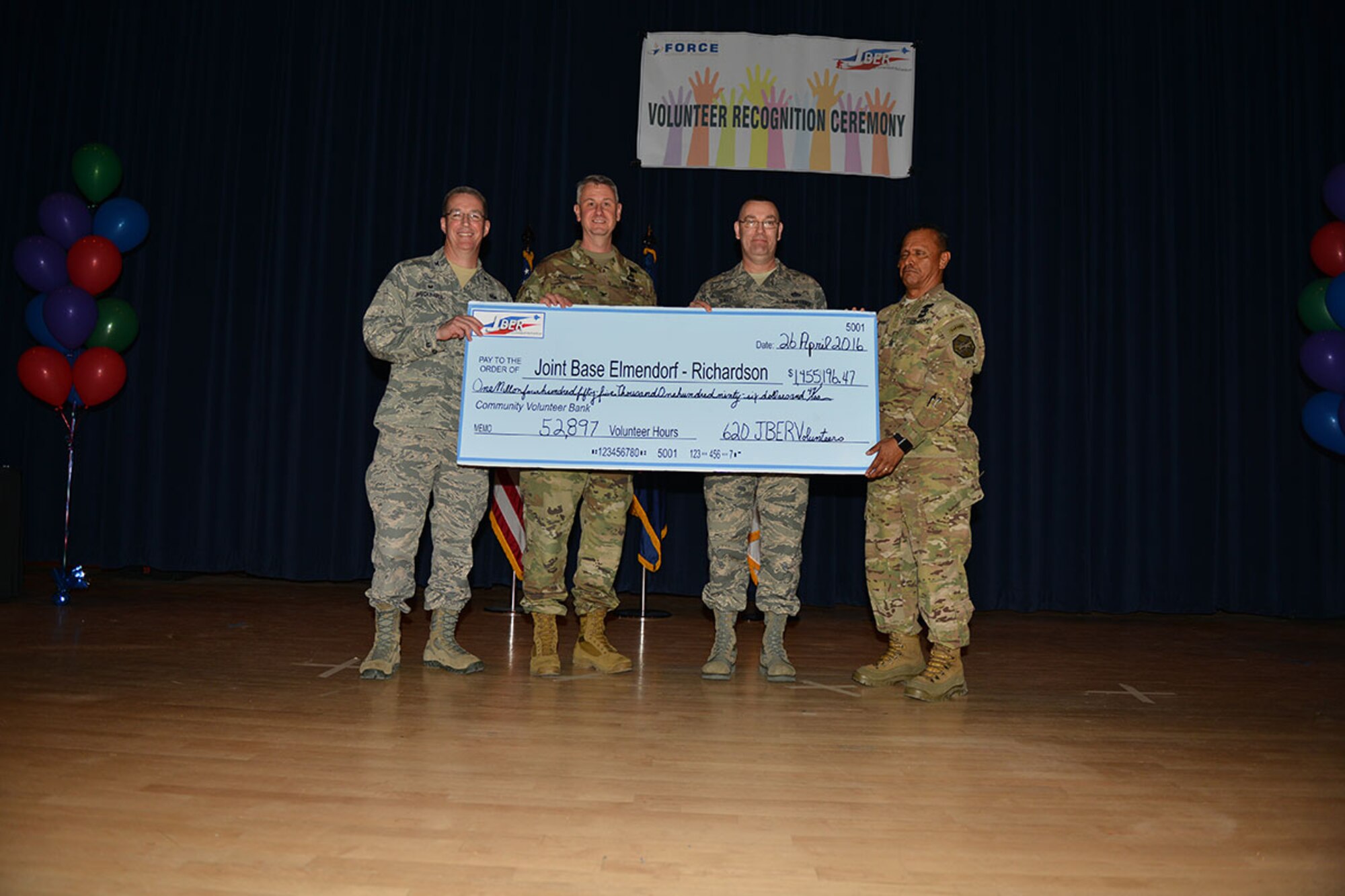 The Volunteer Recognition Ceremony was hosted April 26, recognizing Airmen and Soldiers and civilians who volunteered a cumulative 52,897 hours to the base and Anchorage community. Each volunteer hour has a local established value of $27.51 for a total of nearly $1.5 million. (U.S. Air Force photo by Airman 1st Class Kyle Johnson)