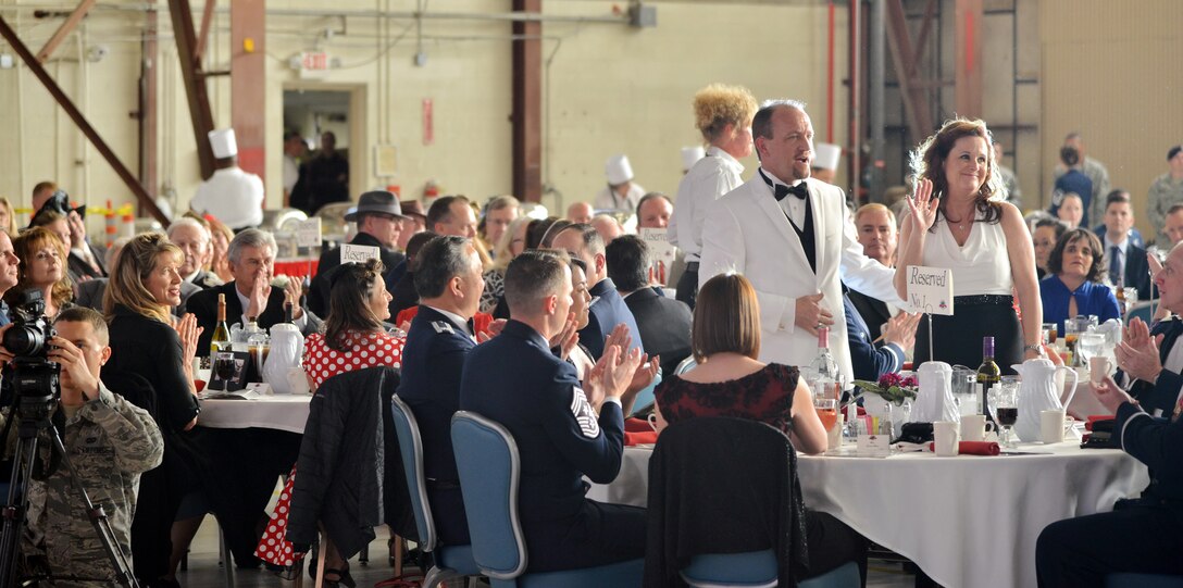 About 500 people attended Kirtland's anniversary banquet at the New Mexico Air National Guard’s 150th Special Operations Wing hangar April 16. The banquet had a 1940s theme, to remember the opening of Albuquerque Army Air Base on Jan. 7, 1941. Period attire and static displays of World War II vehicles helped bring the theme to life. (Photo by Todd Berenger)
