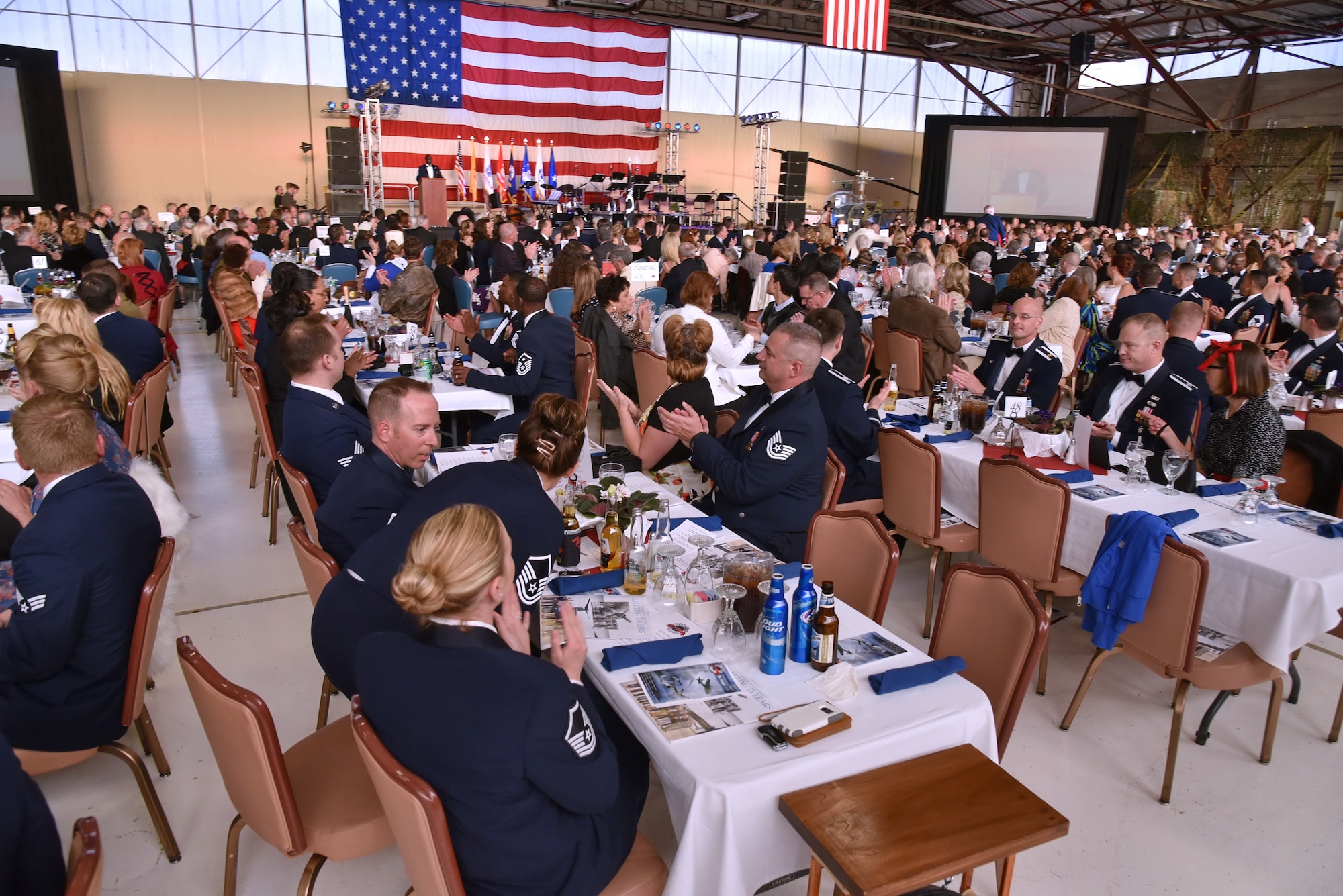 About 500 people attended Kirtland's anniversary banquet at the New Mexico Air National Guard’s 150th Special Operations Wing hangar April 16. The banquet had a 1940s theme, to remember the opening of Albuquerque Army Air Base on Jan. 7, 1941. Period attire and static displays of World War II vehicles helped bring the theme to life. (Photo by Ken Moore)