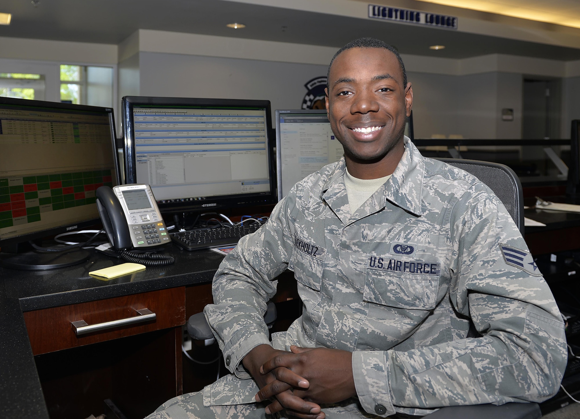 Senior Airman Markese Buckholtz, the 58th FS aviation resource manager, sits at his desk at Eglin Air Force Base, Fla., March 30. Buckholtz will be attending Embry Riddle Aeronautical University in Prescott, Ariz., as part of the Senior Leader Enlisted Commissioning Program. After spending a little over two years in the enlisted force, Buckholtz hopes to commission as an officer after receiving his degree and fly aircraft such as the F-35A Lightning II. (U.S. Air Force photo/Senior Airman Andrea Posey)