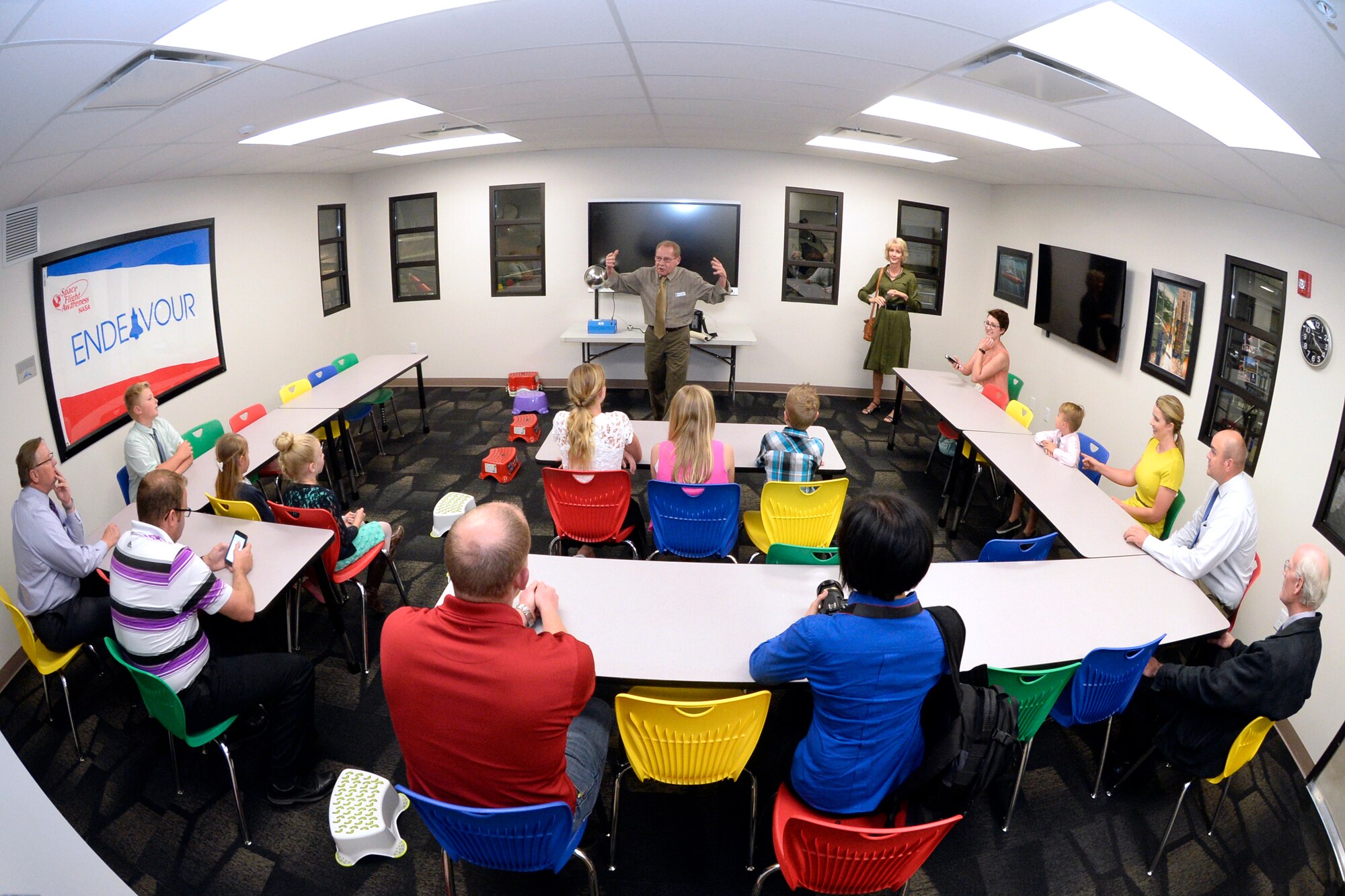 Larry Henkles, Aerospace Center for Education coordinator, demonstrates how static electricity works at the newly opened Lieutenant General Marc C. Reynolds Aerospace Center for Education April 27, 2016. The Reynolds Aerospace Center for Education, located at the Hill Aerospace Museum, is partnering with local school districts providing additional co-curricular educational opportunities with elementary aged school children. Starting in the fall of 2016, additional children will visit the Hill Aerospace Museum and participate in hands-on activities that correspond directly with the Science curriculum of their particular grade. (U.S. Air Force photo by Todd Cromar)