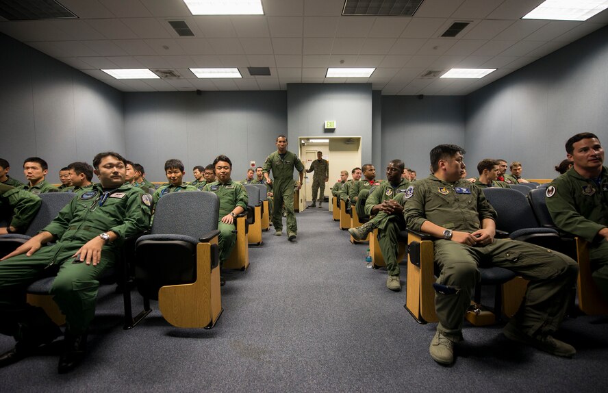 Japan Air Self-Defense Force and U.S. Air Force fighter pilots attend a mission briefing April 22, 2016, at Kadena Air Base, Japan. Naha Air Base’s 304th Fighter Squadron and Kadena Air Base’s 44th Fighter Squadron integrated together to strengthen bilateral relations and strengthen partnership in the Indo-Asia-Pacific Region. (U.S. Air Force photo by Senior Airman Omari Bernard)