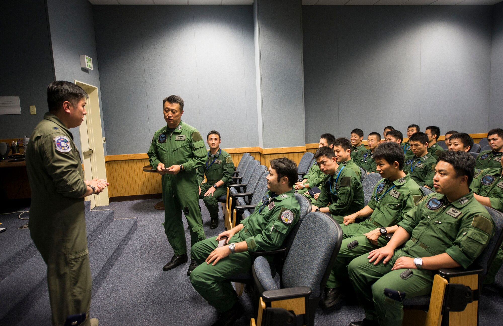 U.S. Air Force Lt. Col. Van Thai, 18th Operations Group deputy commander, introduces himself to Japan Air Self-Defense Force fighter pilots before a mission briefing April 22, 2016, at Kadena Air Base, Japan. Naha Air Base’s 304th Fighter Squadron visited Kadena to further integrate with the 44th Fighter Squadron. (U.S. Air Force photo by Senior Airman Omari Bernard)