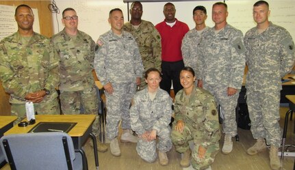 Soldiers from Joint Task Force-Bravo pose for group photo with Roger W. Dickerson, an Army North Sexual Harassment/Assault Response (SHARP) instructor from Fort Sam Houston, Texas, after completing an 80-hour SHARP certification course at Soto Cano Airbase, Honduras, April 14, 2016. Soldiers that graduated from the course will now take leadership in coordinating and managing the JTF-B installation advocacy program while providing direct advocacy support to victims of sexual harassment and sexual assault. (U.S. Air Force photo by Lt. Col. James M. Trachier)