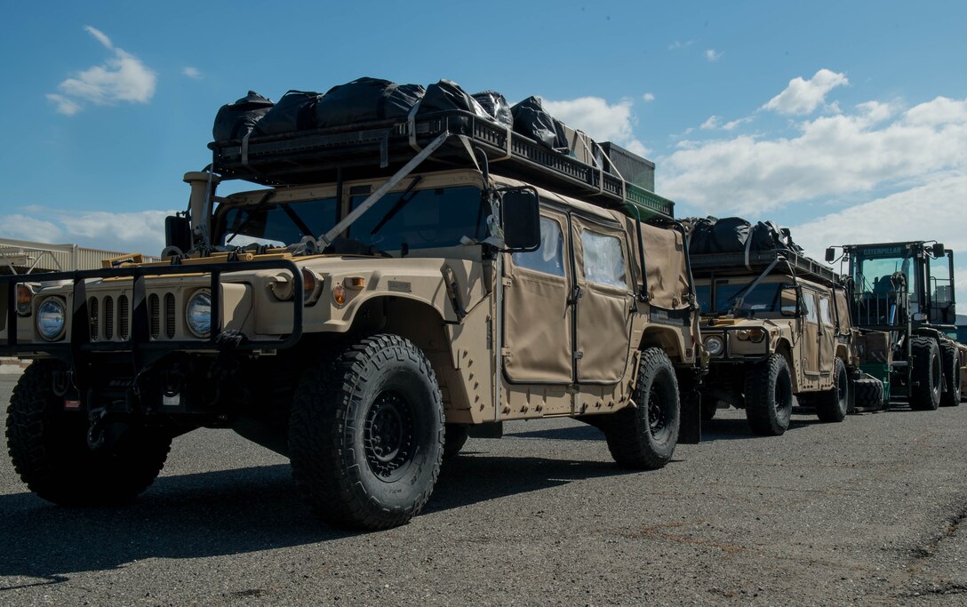 Airmen from the 821st Contingency Response Group prepare equipment to be joint inspected before being loaded on a C-17 Globemaster lll aircraft before departing Travis Air Force Base, Calif., to support earthquake response efforts in Ecuador, April 21, 2016. The 621st Contingency Response Wing is providing an assessment team that includes subject matter liaisons in the realms of aerial port operations, cargo movement, material handling equipment, and communications. The 621st CRW maintains a ready corps of light, lean and agile mobility support forces able to respond as directed in order to meet combatant command requirements for humanitarian aid operations. (U.S. Air Force photo by Staff Sgt. Robert Hicks/Released)