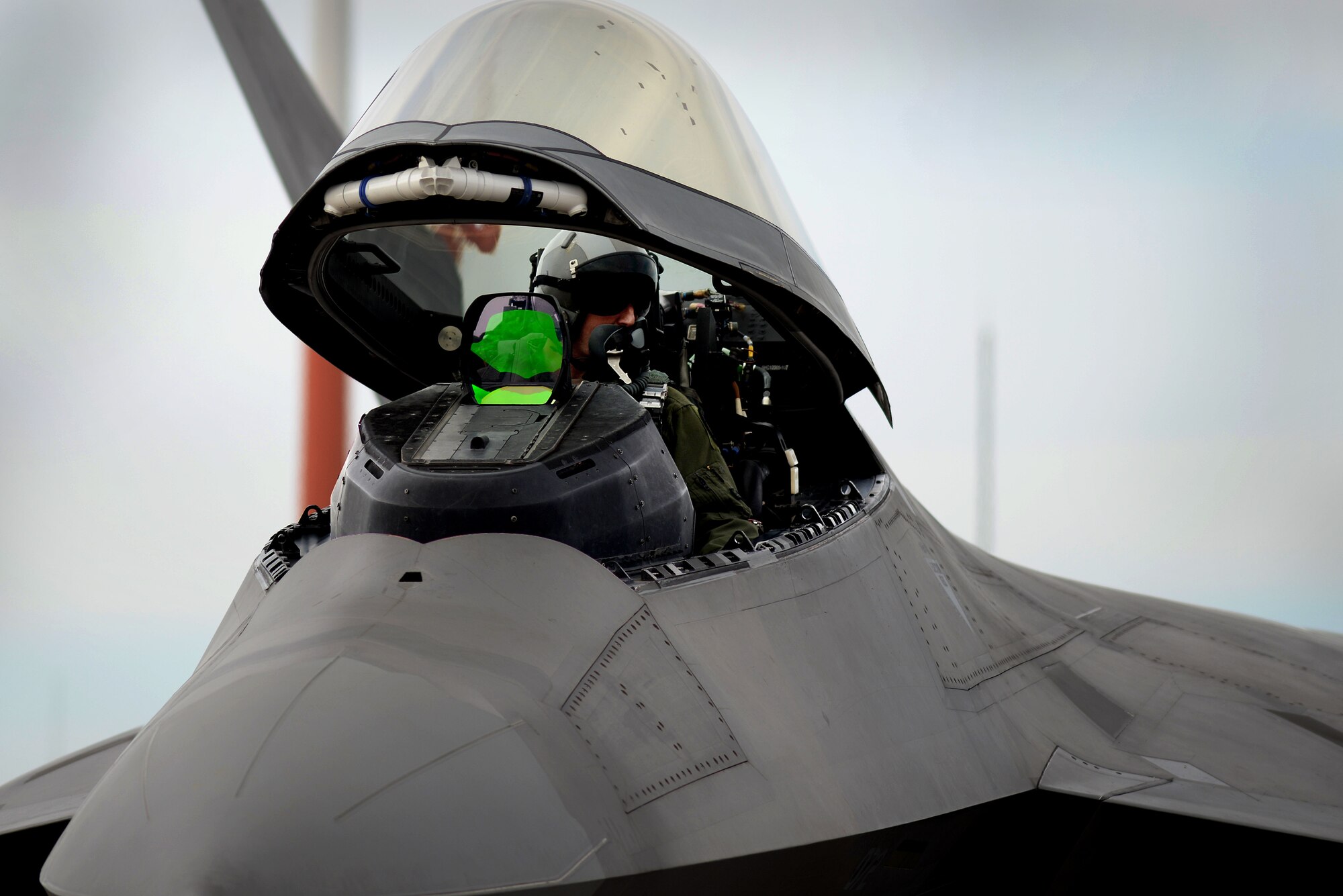 U.S. Air Force Major Michael Frye, 95th Fighter Squadron assistant director of operations, prepares his F-22 Raptor for takeoff April 21, at Royal Air Force Lakenheath, England. Frye conducted air-to-air fighter integration training with F-15E Strike Eagles from the 492nd Fighter Squadron which allows the advanced fifth-generation aircraft a unique opportunity to fly alongside the legacy aircraft while working with joint partners and NATO allies. (U.S. Air Force photo/ Tech. Sgt. Matthew Plew)