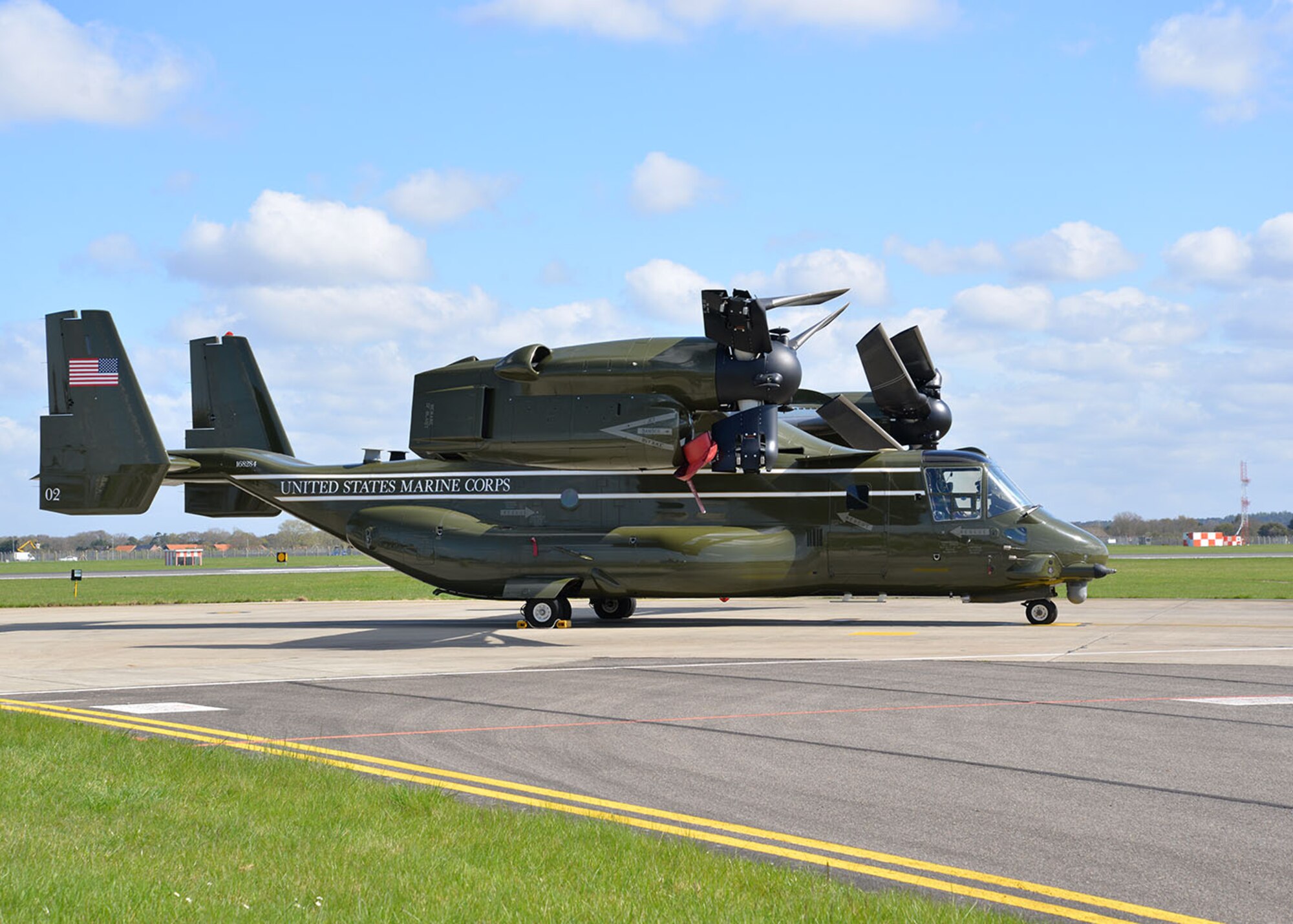 A U.S. Marine Corps MV-22 Osprey sits on the flightline April 19, 2016, on RAF Mildenhall, England. The multi-mission, tilt-rotor military aircraft, based out of Quantico, Va., were at RAF Mildenhall in support of the President’s visit to the United Kingdom for bilateral meetings and to the Hannover Messe being held in Germany. U.S. European Command and US Air Forces in Europe-Air Forces Africa were working with other government agencies in the U.K. and Germany to provide assistance as requested, to ensure a successful visit. (U.S. Air Force photo by Karen Abeyasekere/Released)