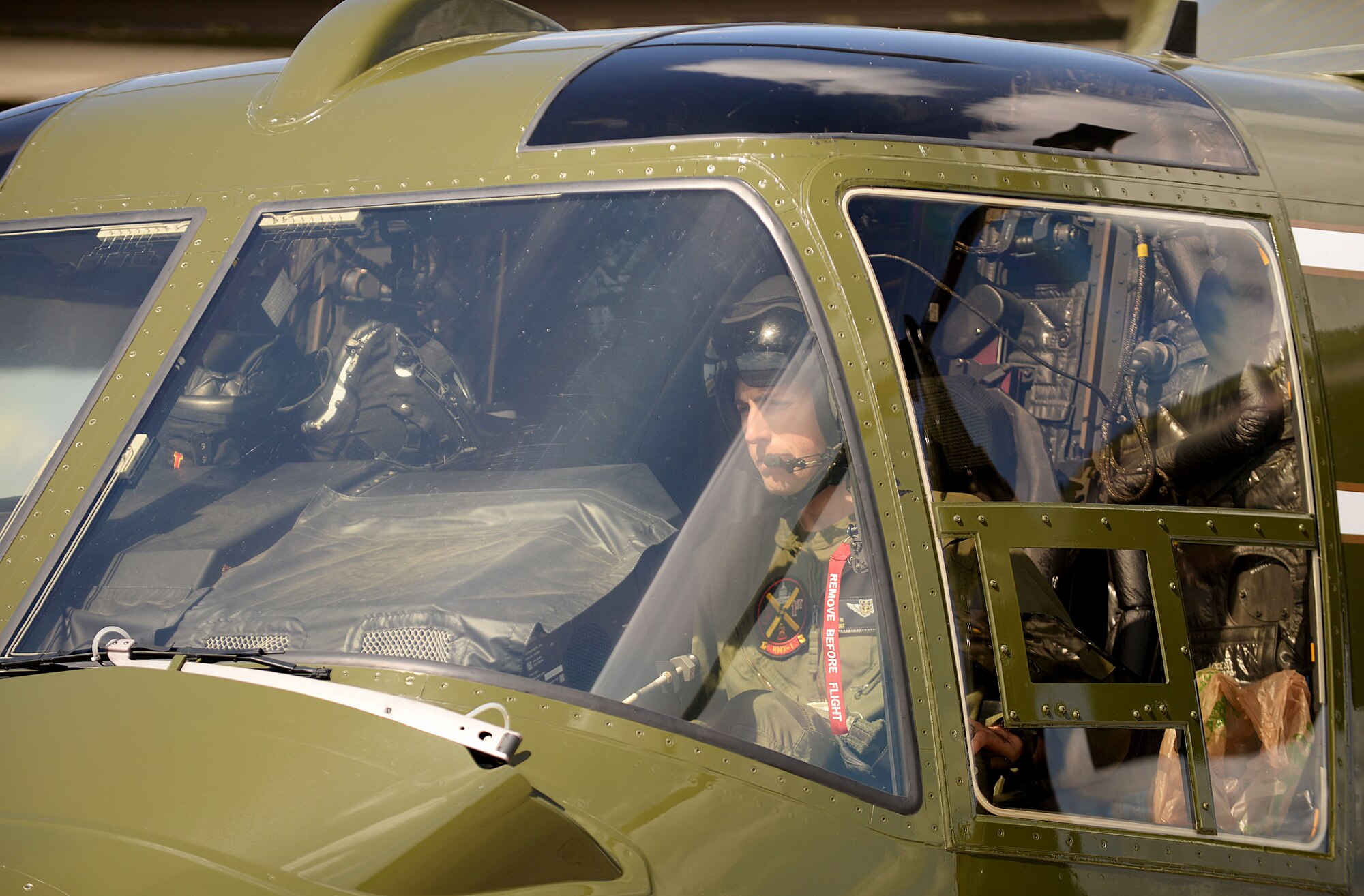 U.S. Marine Corps crew chiefs, from Quantico, Va., conduct pre-flight checks on a MV-22 Osprey to ensure the aircraft is flight ready April 19, 2016, on RAF Mildenhall, England. The aircraft were here on the fightline in support of the President’s visit to the United Kingdom and Germany where he held bilateral meetings and participated in the Hannover Messe. U.S. European Command and U.S. Air Forces in Europe-Air Forces Africa were working with other government agencies and authorities in the UK and Germany to provide assistance as requested to ensure a successful visit. (U.S. Air Force photo by Airman 1st Class Tenley Long/Released)