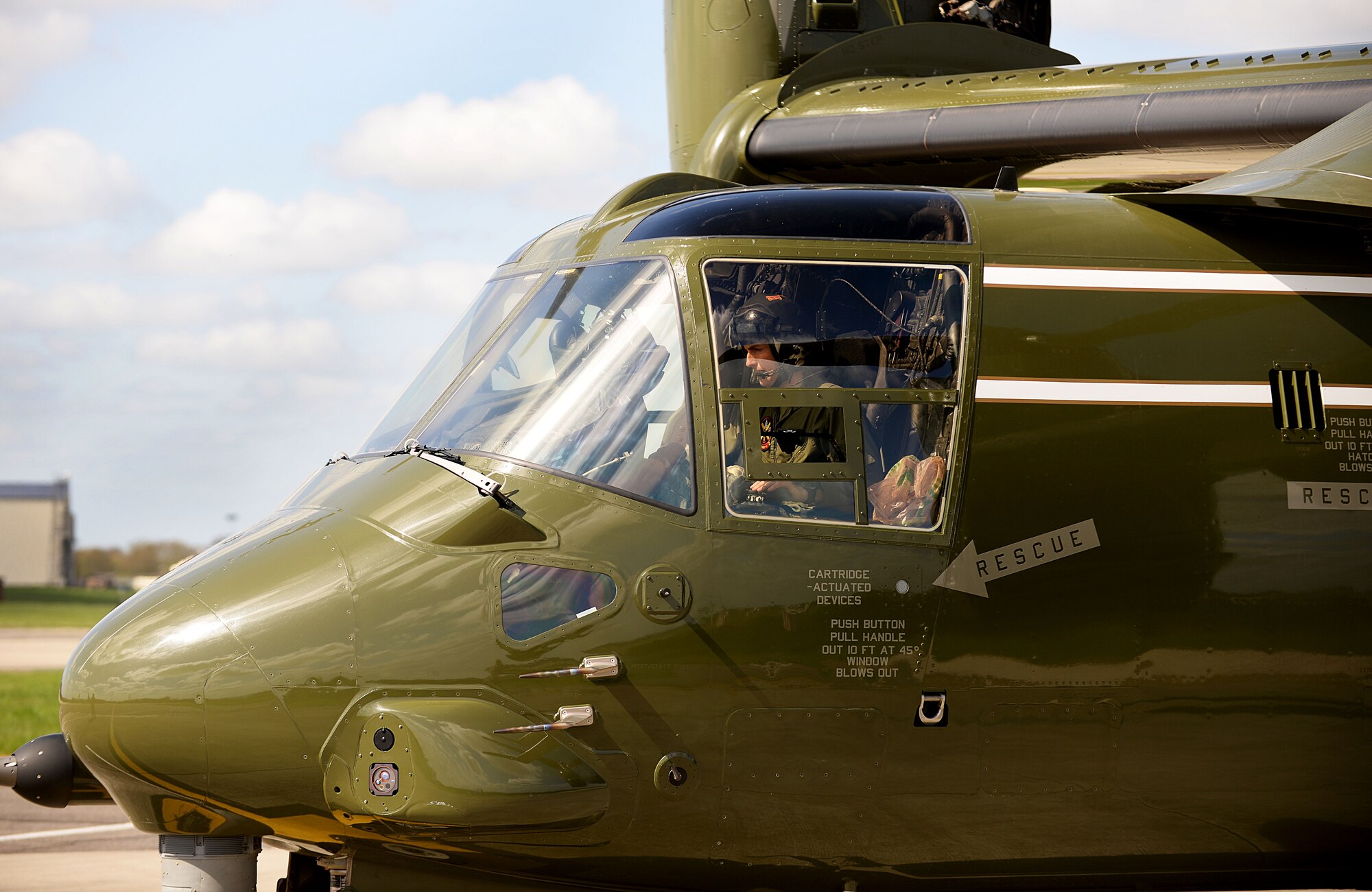 U.S. Marine Corps crew chiefs, from Quantico, Va., conduct pre-flight checks on a MV-22 Osprey to ensure the aircraft is flight ready April 19, 2016, on RAF Mildenhall, England. The aircraft were here on the fightline in support of the President’s visit to the United Kingdom and Germany where he held bilateral meetings and participated in the Hannover Messe. U.S. European Command and U.S. Air Forces in Europe-Air Forces Africa were working with other government agencies and authorities in the UK and Germany to provide assistance as requested to ensure a successful visit. (U.S. Air Force photo by Airman 1st Class Tenley Long/Released)