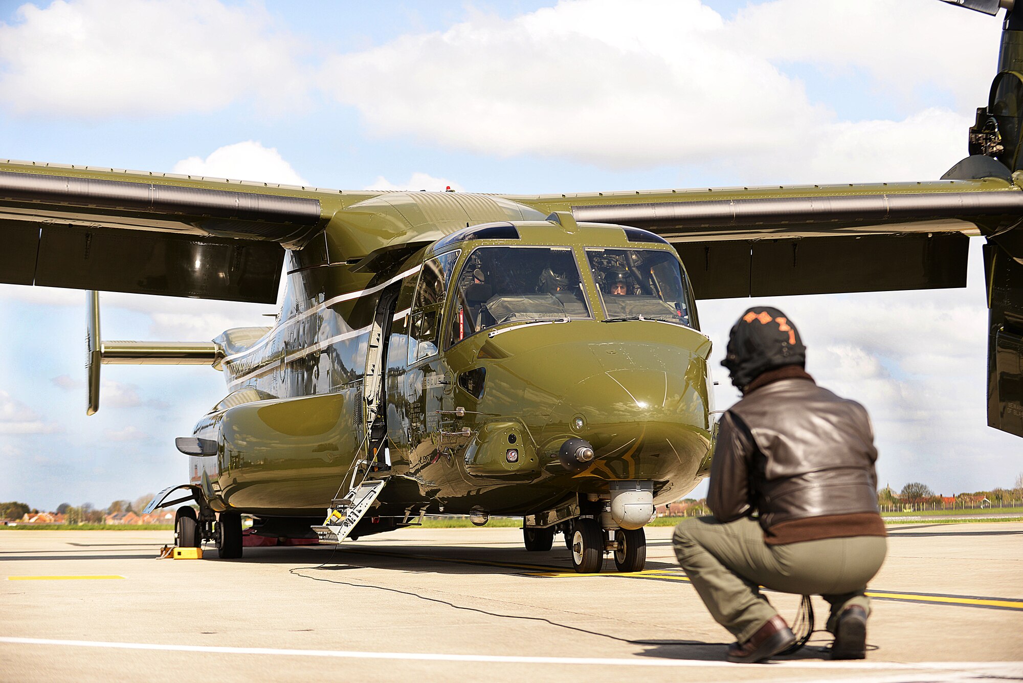 U.S. Marine Corps Staff Sgt. Patrick Riley and Cpl. Jonathan Renshaw, MV-22 Osprey crew chiefs, conduct pre-flight inspections to ensure the aircraft are flight ready April 19, 2016, on RAF Mildenhall, England. The aircraft were on the flightline in support of the President’s visit to the United Kingdom and Germany where he held bilateral meetings and participated in the Hannover Messe. U.S. European Command and U.S. Air Forces in Europe-Air Forces Africa were working with other government agencies and authorities in the U.K. and Germany to provide assistance as requested to ensure a successful visit. (U.S. Air Force photo by Airman 1st Class Tenley Long/Released)