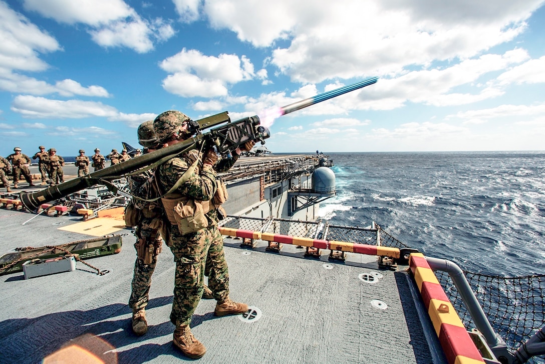 Marines fire stinger simulation rounds aboard the USS Wasp in the Atlantic Ocean, April 17, 2016. The Marines are assigned to Medium Marine Tiltrotor Squadron 264, 22nd Marine Expeditionary Unit, which is underway for an amphibious exercise. Marine Corps photo by Cpl. Ryan G. Coleman