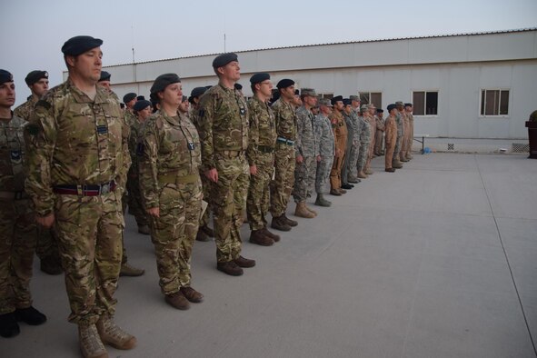 Military members from five coalition nations and the United States assembled for ANZAC Day, which began at dawn at an undisclosed location in Southwest Asia on April 25, 2016. Australian and New Zealand Army Corps forces quickly became known as Anzacs, and the pride they took in that name endures to this day according to the Australian War Memorial website. (U.S. Air Force photo by Tech. Sgt. Carlos J. Trevino/Released)

