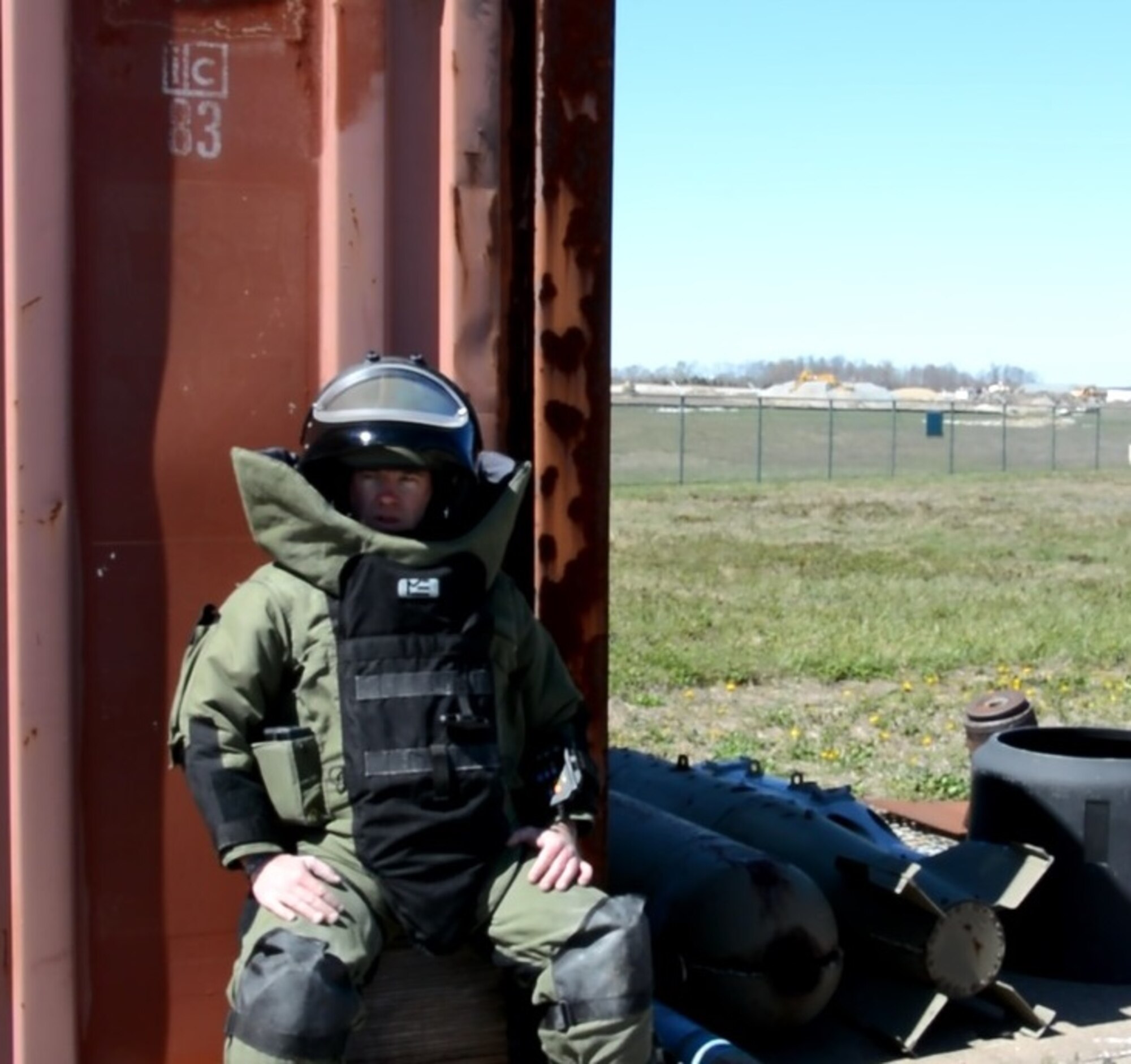 Staff Sgt. John Nelson, 512th Explosive Ordnance Flight, rests after completing his training exercise involving identifying, inspecting and rendering safe a simulated improvised explosive device April 3, 2016 at Dover Air Force Base, Delaware. Were this a real world situation, the device would be transferred to a secure location for disposal after it was rendered safe. (U.S. Air Force photo/Staff Sgt. Joe Yanik)