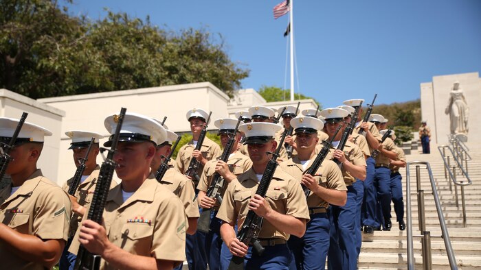 Marines from 2nd Battalion, 3rd Marine Regiment march down the National Memorial Cemetery of the Pacific, Honolulu, to “Waltzing Matilda,” a famous Australian ballad, April 25, 2016. This is the 44th year U.S. Marines have participated in the commemoration of the Australia New Zealand Army Corps Day, highlighting a long-lasting friendship between the three countries. 